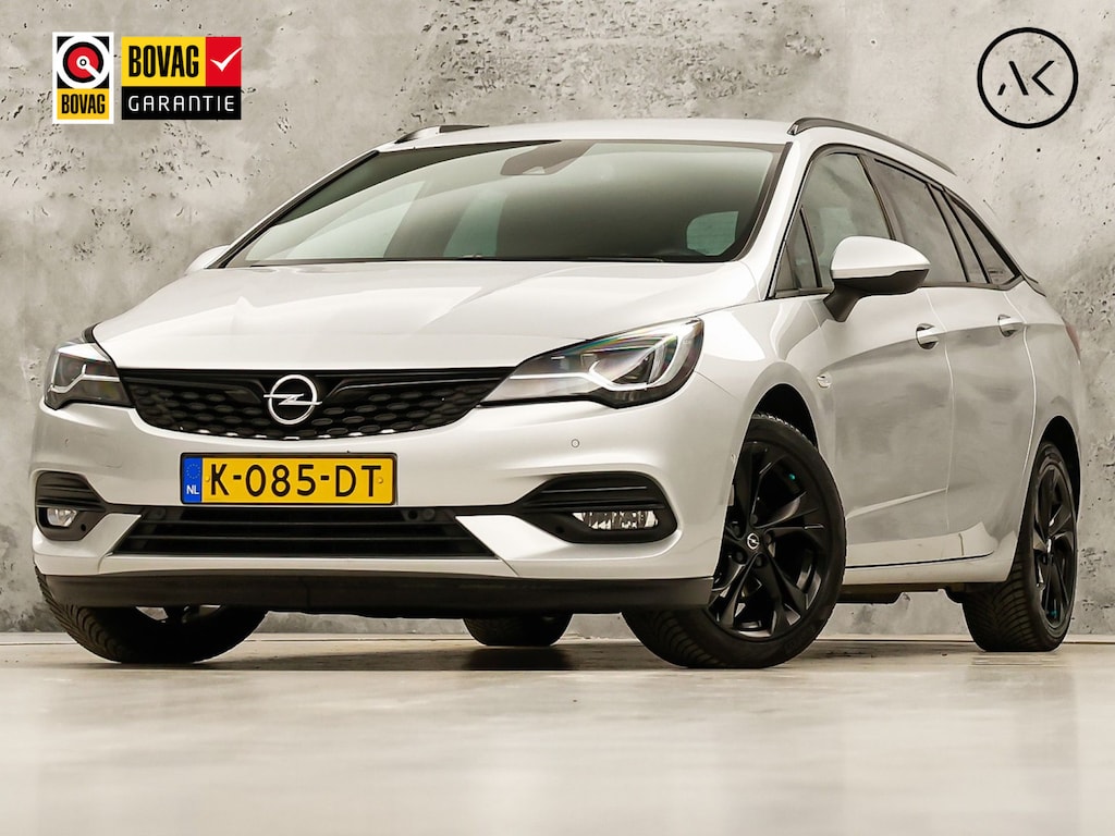 Opel Astra Sports Tourer 1.2 Ultimate 145Pk (VIRTUAL COCKPIT, APPLE CARPLAY, GROOT NAVI, CAMERA, LEDER/ALCANTARA, SPORTSTOELEN, TREKHAAK, ZWART HEMEL, ADAPTIVE CRUISE, NIEUWSTAAT)