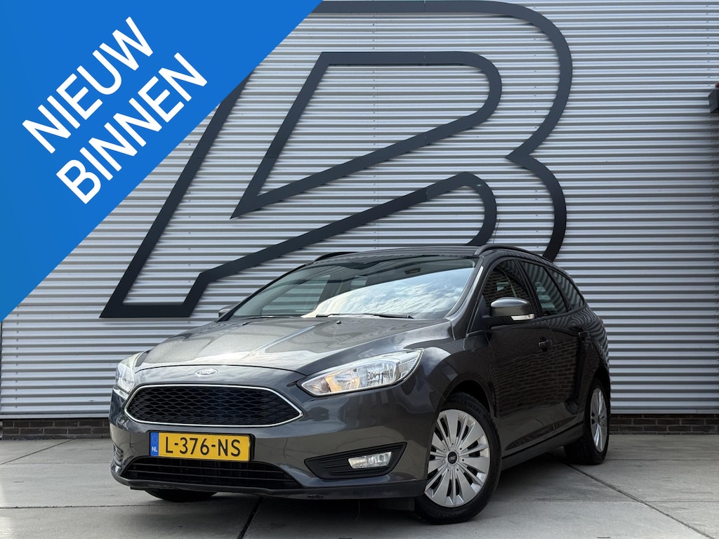 Ford Focus Wagon 1.0 Titanium 1e Eigenaar|Navi|Trekhaak|Carplay|Cruise|Airco|PDC|Stoelverwarming|APK tot 07-2027