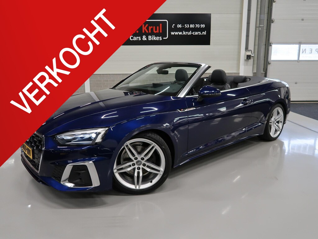 Audi A5 Cabriolet 40 TFSI Launch edition Sport S-Line Matrix Nekverwarming Trekhaak 3-Zone airco Digitaal Camera ACC Navigatie Automaat Alcantara Massagestoelen App connect 19 inch Sportvelgen Navarrablauw metallic Nieuwstaat