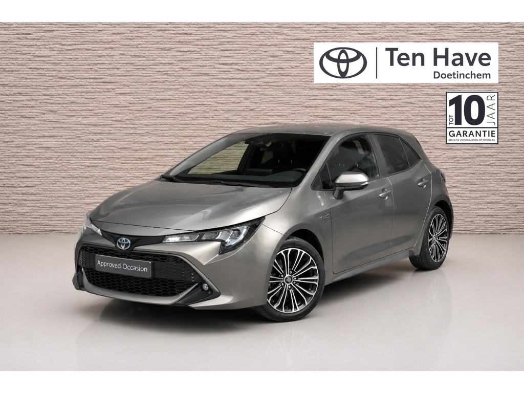 Toyota Corolla 1.8 Hybrid Dynamic Automaat | Apple Carplay / Android auto | Stoelverwarming | 7 inch digitaal instrumentenpaneel | Regensensor | Automatisch dimmende binnenspiegel | Schakelflippers achter stuur (al