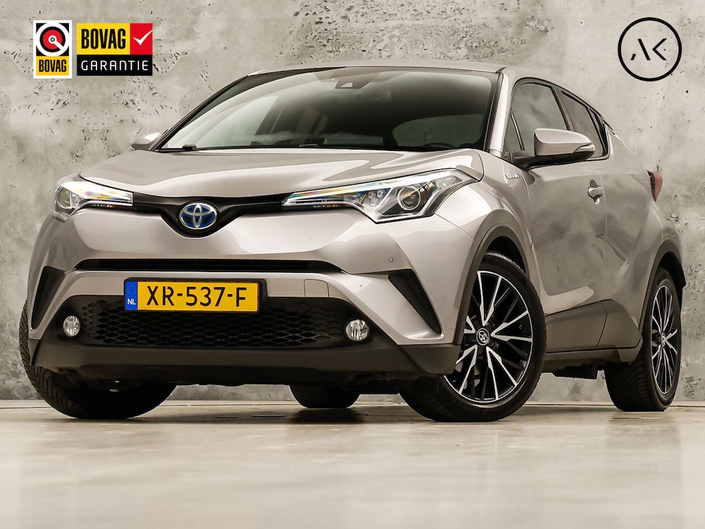 Toyota C-HR / C-HR+ 1.8 Hybrid Sport Automaat (NAVIGATIE, CAMERA, STUUR/STOELVERWARMING, GETINT GLAS, SPORTSTOELEN, ADAPTIVE CRUISE, KEYLESS, NIEUWSTAAT)