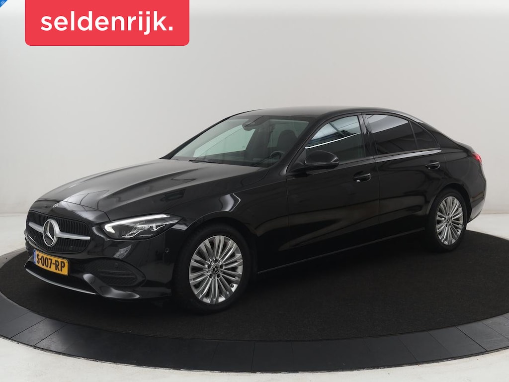Mercedes-Benz C-klasse 180 Business Line | Leder | Stoelverwarming | Cruise control | Camera | Park assist | Navigatie | Bluetooth | 17" velgen