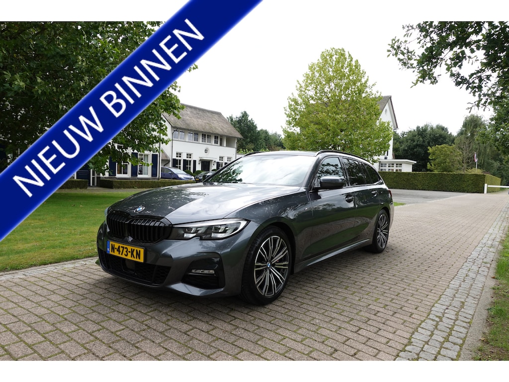 BMW 3-Serie Touring 330i High Executive M-sport | Adaptieve Cruise | Trekhaak | Camera | CarPlay | LED |