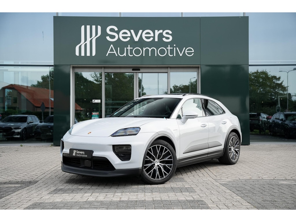 Porsche Macan 100 kWh IJsgrijs metallic | Luchtvering PASM | Panoramadak | Porsche InnoDrive incl. actieve rijstrookgeleiding | 360° Surround View incl. actieve parkeerassistent | Adaptieve cruise control (ACC) | 21 inch Macan Design velgen | Warmtepomp |
