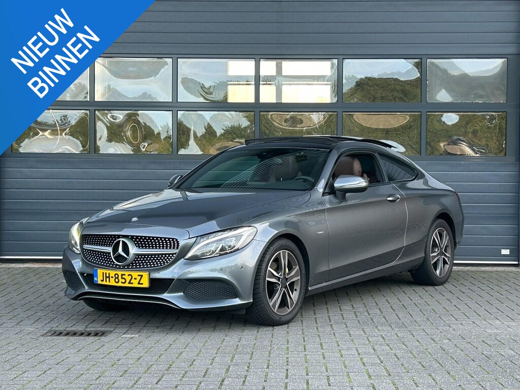 Mercedes-Benz C-klasse COUPÉ 180 EDITION ONE I AUTOMAAT I SCHUIF/KANTELDAK I LEDEREN BEKLEDING I STOELVERWARMING