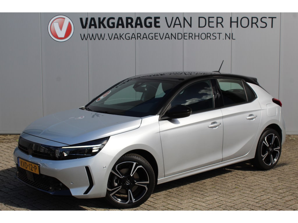 Opel Corsa 1.2-100pk Turbo Ultimate. In nieuwstaat verkerende Opel Corsa ! Autm. airco, cruise cntrl, lane assist, panoramadak, verwarmde stoelen, LM wielen, camera, pdc v+a, navigatie by Apple Carplay/Android auto, metallic, LED verl. etc.