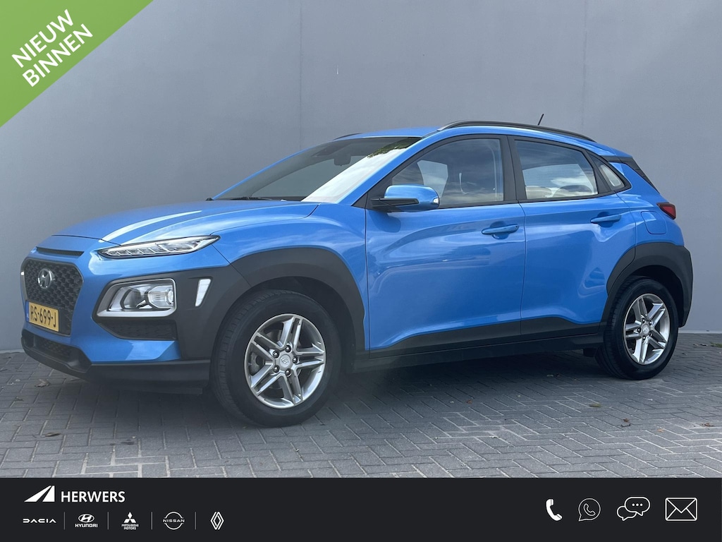 Hyundai Kona 1.0T Comfort / Afneembare Trekhaak (1.200KG) / 100% Dealeronderhouden / 1e Eigenaar / Navigatie DMV Apple Carplay&Android Auto / Dab / Achteruitrij Camera / Lichtmetalen Velgen 16" /