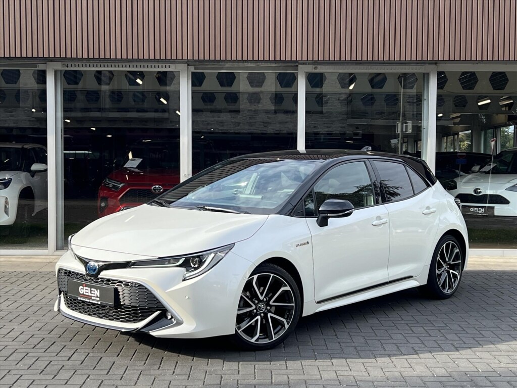 Toyota Corolla 1.8 Hybrid Executive | Parelmoer wit, 18 inch, Leer/Alcantara, Stoelverwarming, Parkeersensoren, Keyless, Apple CarPlay/Android auto