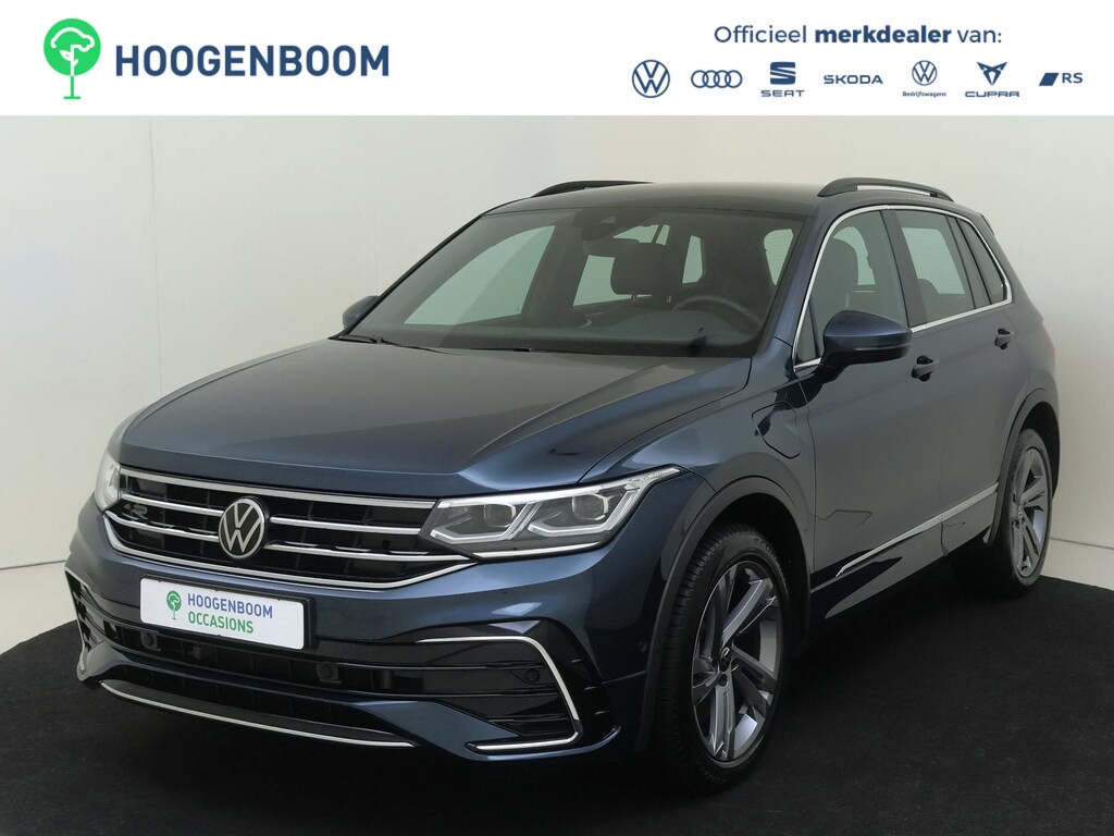 Volkswagen Tiguan 1.4 TSI eHybrid R-Line Business | SoH 88% | Trekhaak | Achteruitrijcamera | Matrix LED verlichting | Adaptieve cruise control | Dodehoekdetectie | Stoel- en stuurwielverwarming | Navigatie | Carplay |