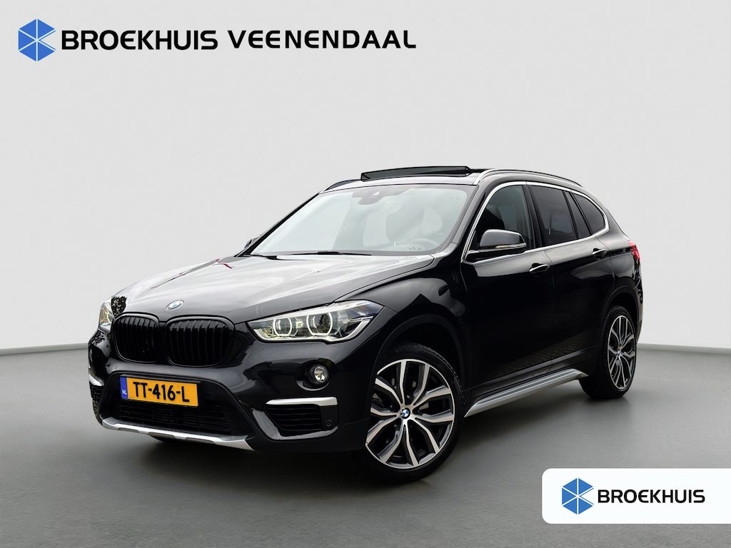 BMW X1 sDrive20i Orange Edition II | Dealer OH! | Pano | Trekhaak | Leder | H&K Audio