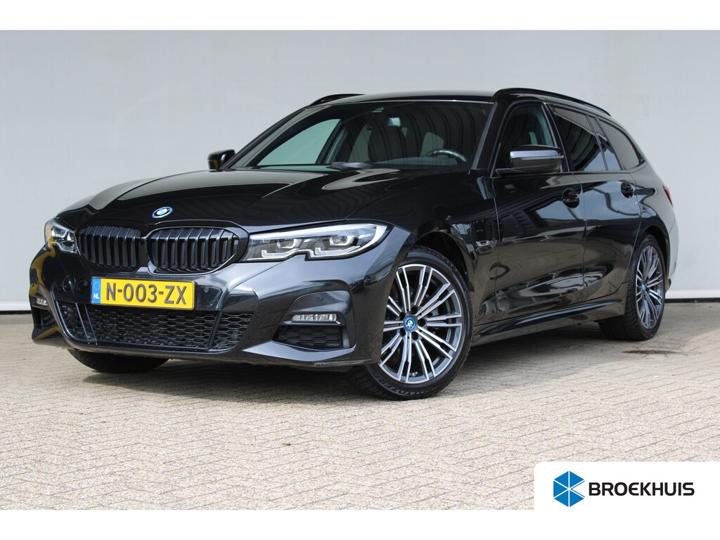 BMW 3-Serie Touring 320e Business Edition Plus | SOH 93% | M-sport | Ledere bekleding | Elektrische achterklep | Navigatie |