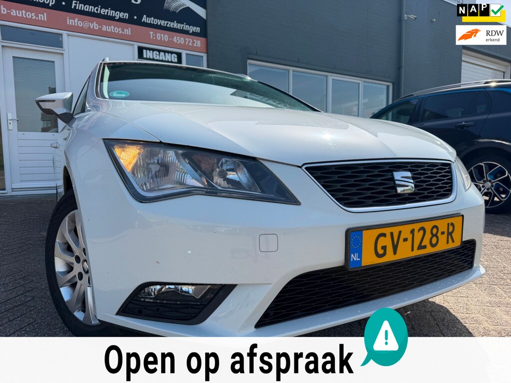 SEAT Leon ST 1.2 TSI Style met trekhaak en parkeersensoren en navigatie en bluetooth en cruise controle en airco