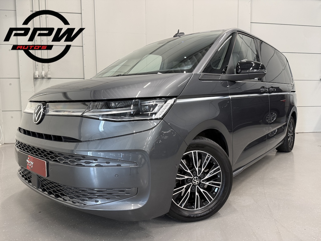 Volkswagen Multivan 1.4 eHybrid Energetic 7p. PANO/LEER+MASSAGE/ADAPTIVE-ONDERSTEL/H&K/HEAD-UP/KEYLESS/EL.SCHUIFDEUREN/SFEER/ACC/CAMERA/PRIVACY/EL.A.KLEP/INDIUMGRAU METALLIC/VOLLEDIG VW DEALER HISTORIE