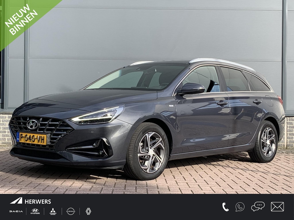 Hyundai i30 Wagon 1.5 T-GDi MHEV Premium / Dealer onderhouden / Trekhaak / 1410 kg Trekgewicht / Navigatiesysteem / Stoel en Stuurverwarming / Apple carplay / Android auto /