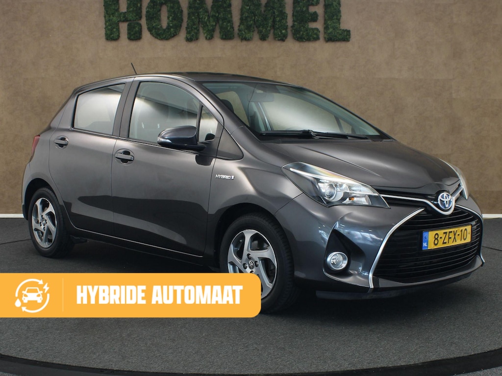 Toyota Yaris 1.5 Hybrid Lease - ACHTERUITRIJCAMERA - BLUETOOTH TELEFOONVOORBEREIDING - CRUISE CONTROL - CLIMATE CONTROL - ELEKTRISCHE RAMEN VOOR - LICHTMETALEN VELGEN - NAVIGATIESYSTEEM