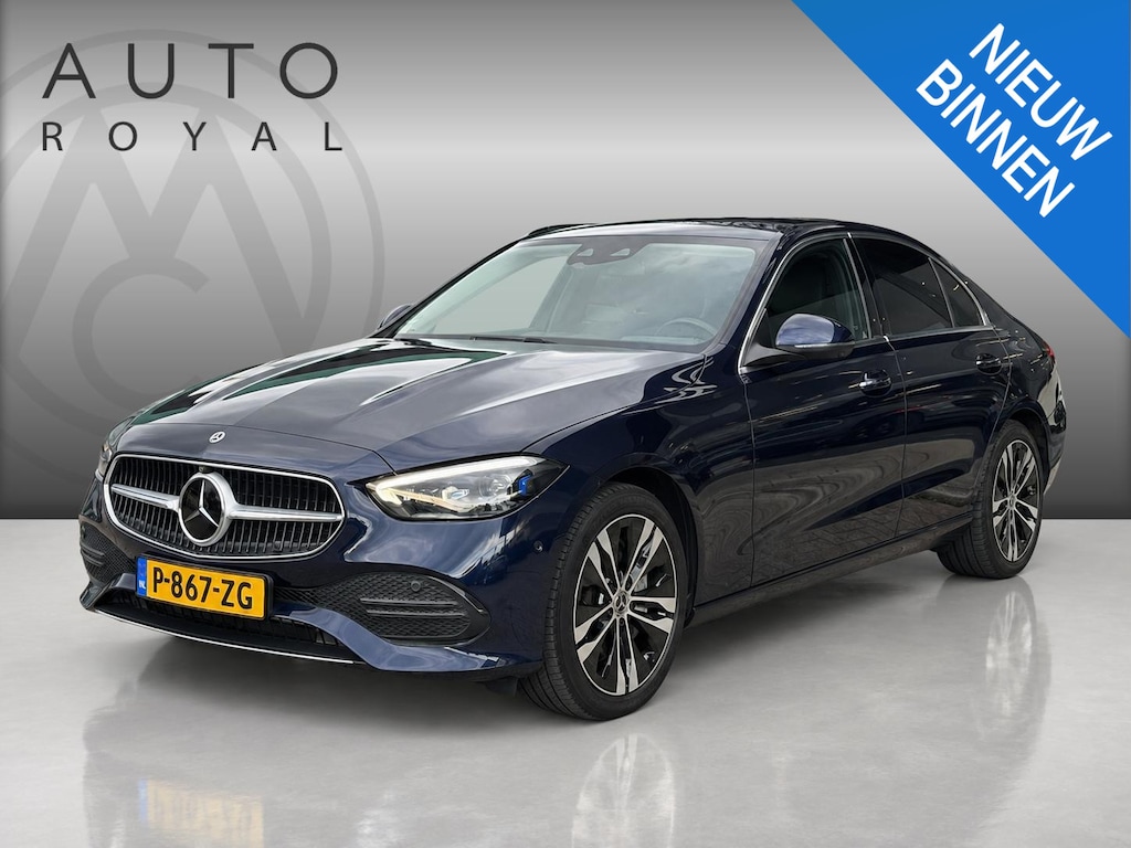 Mercedes-Benz C-klasse 300 e Luxury Line WEG KLAPBARE TREKHAAK | SFEER VERLICHTING | 360 GRADEN CAMERA |  ELEKTRISCH VERSTELBARE STOELEN | STOELVERWARMING | STUURVERWARMING | STOELKOELING | PANORAMADAK | NAVIGATIE | LED | DODEHOEK DETECTIE | APPLE CARPLAY / ANDROID AUTO | ADAPTIEVE CRUISECONTROL |
