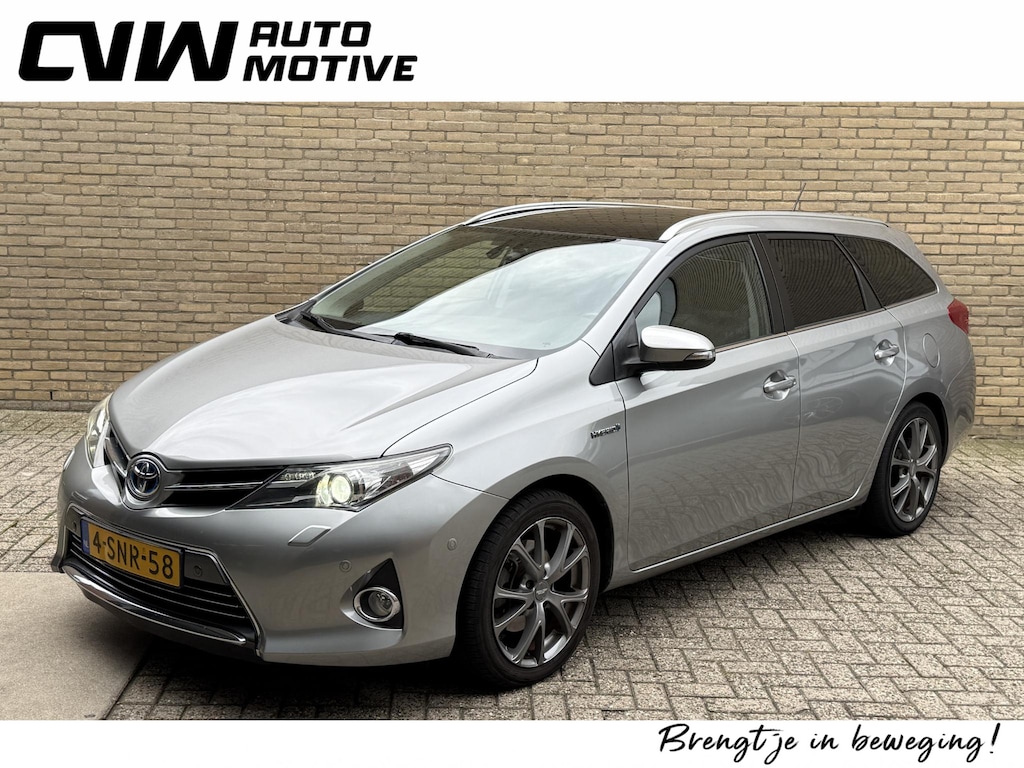 Toyota Auris Touring Sports 1.8 Hybrid | Panoramadak | Camera | Half leder | Stoelverwarming | Navigatie | Cruise control | Climate control | 17 inch velgen | Keyless | Elektrische ramen | Volledig onderhouden | Origineel Nederlandse auto met NAP