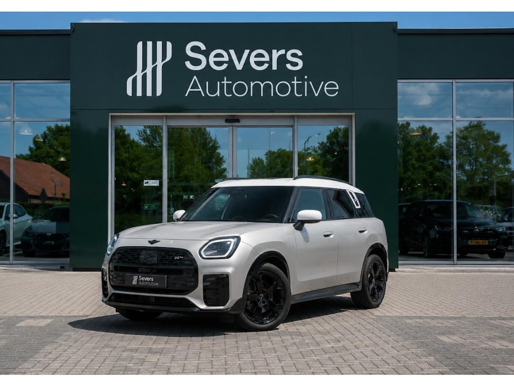 MINI Countryman SE ALL4 John Cooper Works XL 66.5 kWh | Panoramadak | Driving Assistant Plus | Trekhaak | Head-up Display |  Elektrische JCW Sportstoel met Memory | Harman/kardon Surround Sound System |