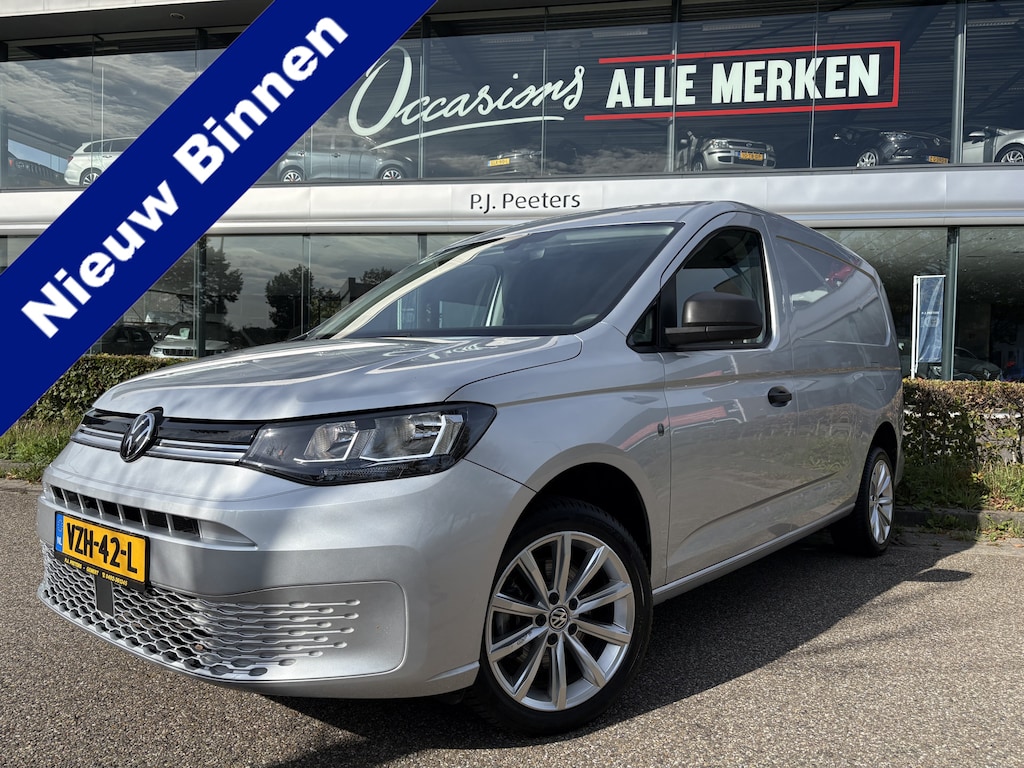 Volkswagen Caddy Maxi Cargo 2.0 TDI Comfort Airco - Apple carplay - Parkeersensor achter - Zijschuifdeur rechts - Tussenschot volledig - Zijwandbekleding laadruimte - Cruise control - Bluetooth - Start/stop systeem - Elektrische ramen - Stuur multifunctioneel - Regensensor