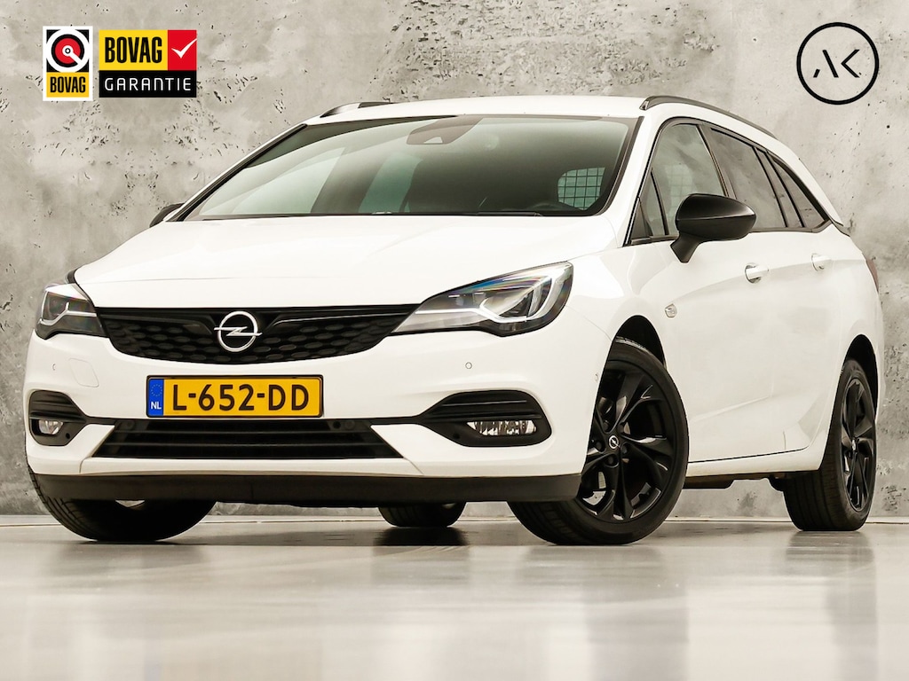 Opel Astra Sports Tourer 1.4 Ultimate 145Pk Automaat (VIRTUAL COCKPIT, APPLE CARPLAY, GROOT NAVI, LEDER/ALCANTARA, CAMERA, SPORTSTOELEN, GETINT GLAS, ZWART HEMEL, ADAPTIVE CRUISE, NIEUWSTAAT)