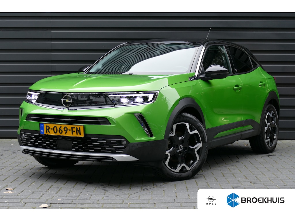 Opel Mokka-e EV 136PK 50KWH ULTIMATE AUTOMAAT / CAMERA / STOEL-STUURVERWARMING/ CARPLAY / KEYLESS / FULL-LED / ALCANTARA / 18"LMV / NAVI / CLIMA / PDC / BLUETOOTH / ADAPT. CRUISECONTROL / 2E EIGENAAR / SCHITTERENDE STAAT !!