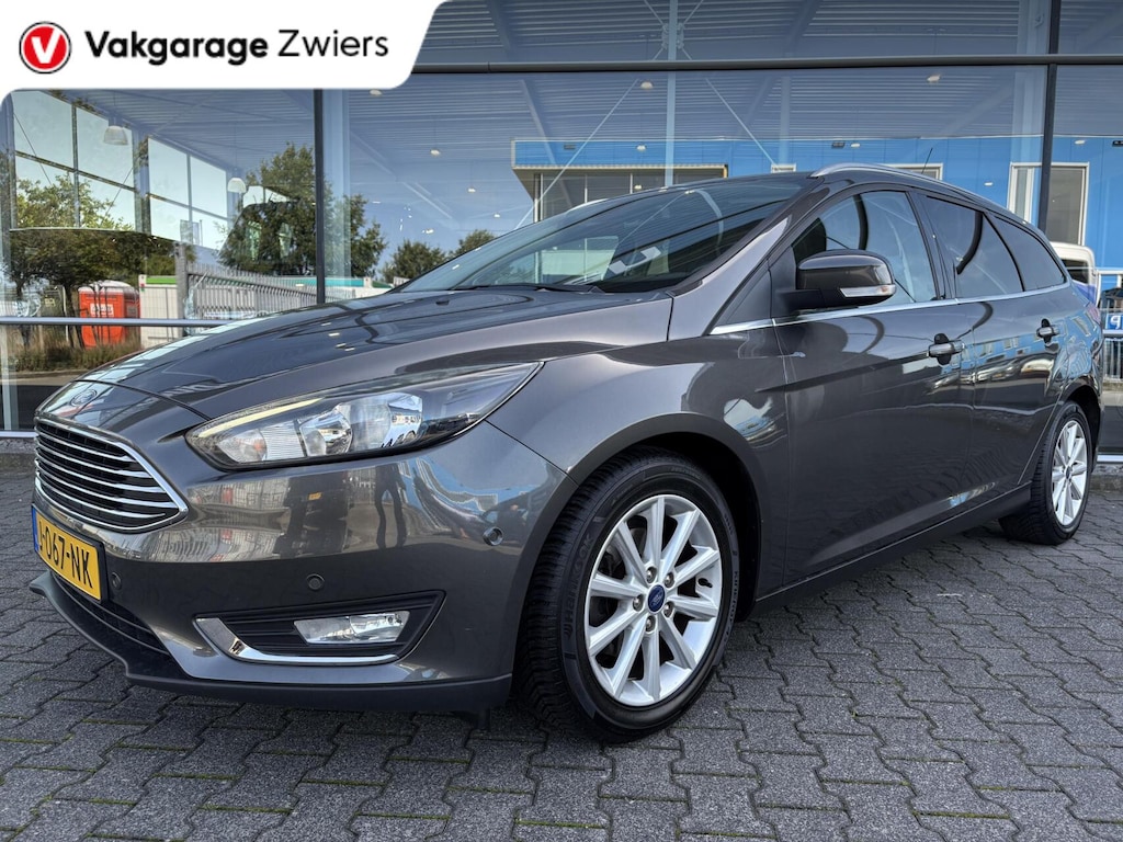 Ford Focus Wagon 1.0 Titanium|Stoel/stuur.verw|Navi|Afnm.trekhaak.