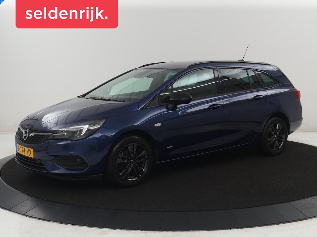 Opel Astra Sports Tourer 1.2 Design & Tech | Cruise control | Camera | Park assist | Trekhaak | Dodehoek detectie | Navigatie | Carplay | Climate control | 16" velgen