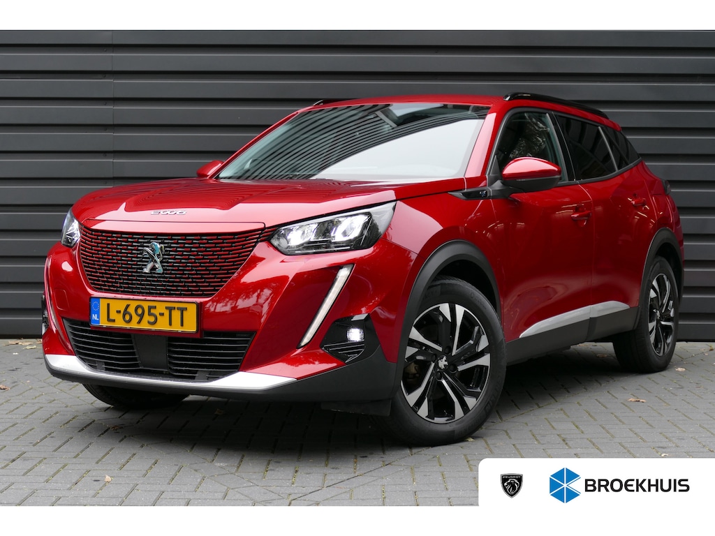 Peugeot e-2008 136PK 50KWH ALLURE PACK AUTOMAAT / CAMERA / STOELVERWARMING / SOH 89,31% / KEYLESS / CARPLAY / 17"LMV / NAVI / CLIMA / LED / PDC / BLUETOOTH / ADAPT. CRUISECONTROL / 1E EIGENAAR / SCHITTERENDE STAAT !!