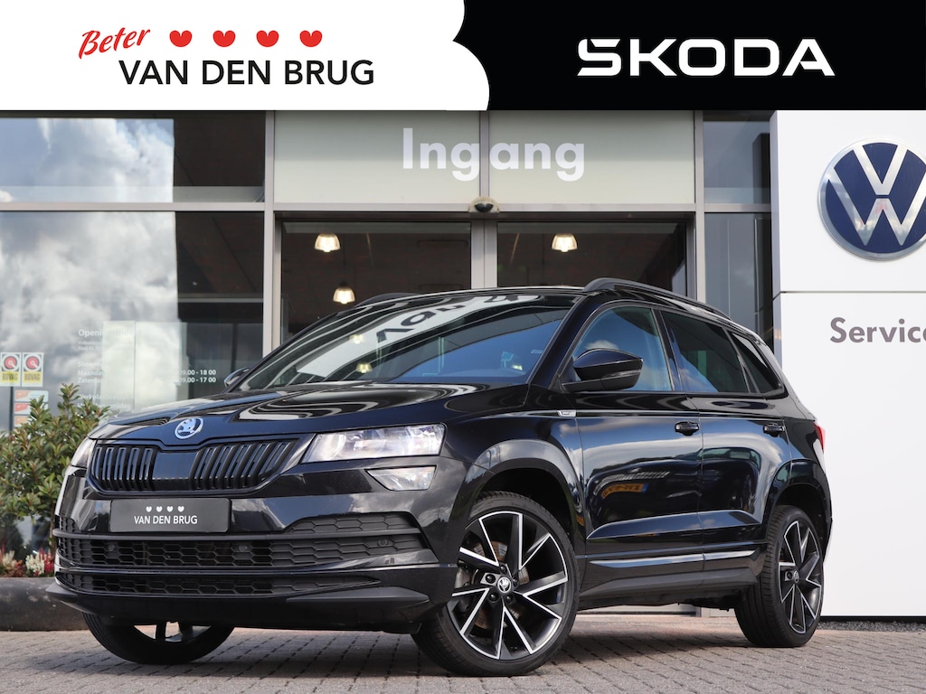 Skoda Karoq 1.5 TSI 150 pk DSG ACT Sportline Business | Trekhaak | Standkachel | Camera | Stoel + Stuurverwarming | Navigatie | Cruise Control |