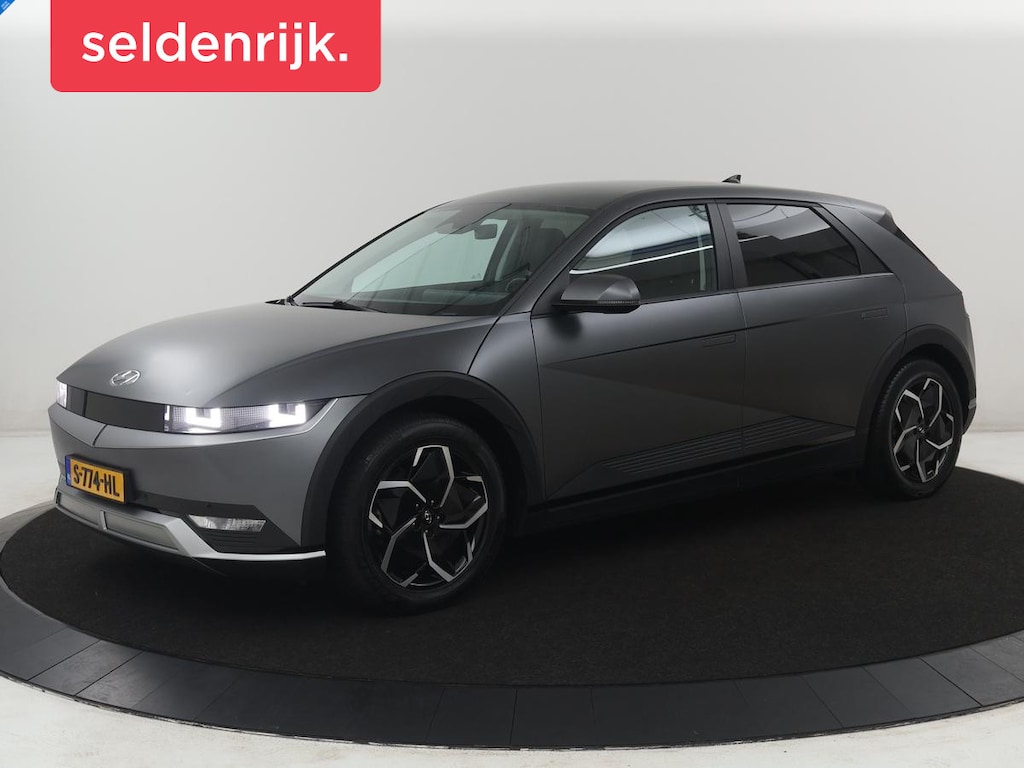 Hyundai Ioniq 5 Connect 77.4 kWh | SOH 94,1% | Half leder | Stuur/stoel verwarming Adaptive cruise | Trekhaak | BOSE sound | Camera | Park assist | Carplay | Climate control | Full LED