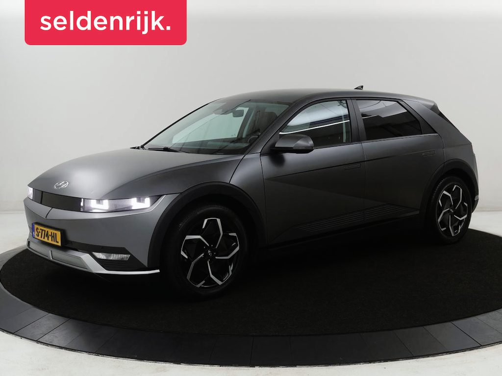 Hyundai Ioniq 5 Connect 77.4 kWh | SOH 94,1% | Half leder | Stuur/stoel verwarming Adaptive cruise | Trekhaak | BOSE sound | Camera | Park assist | Carplay | Climate control | Full LED