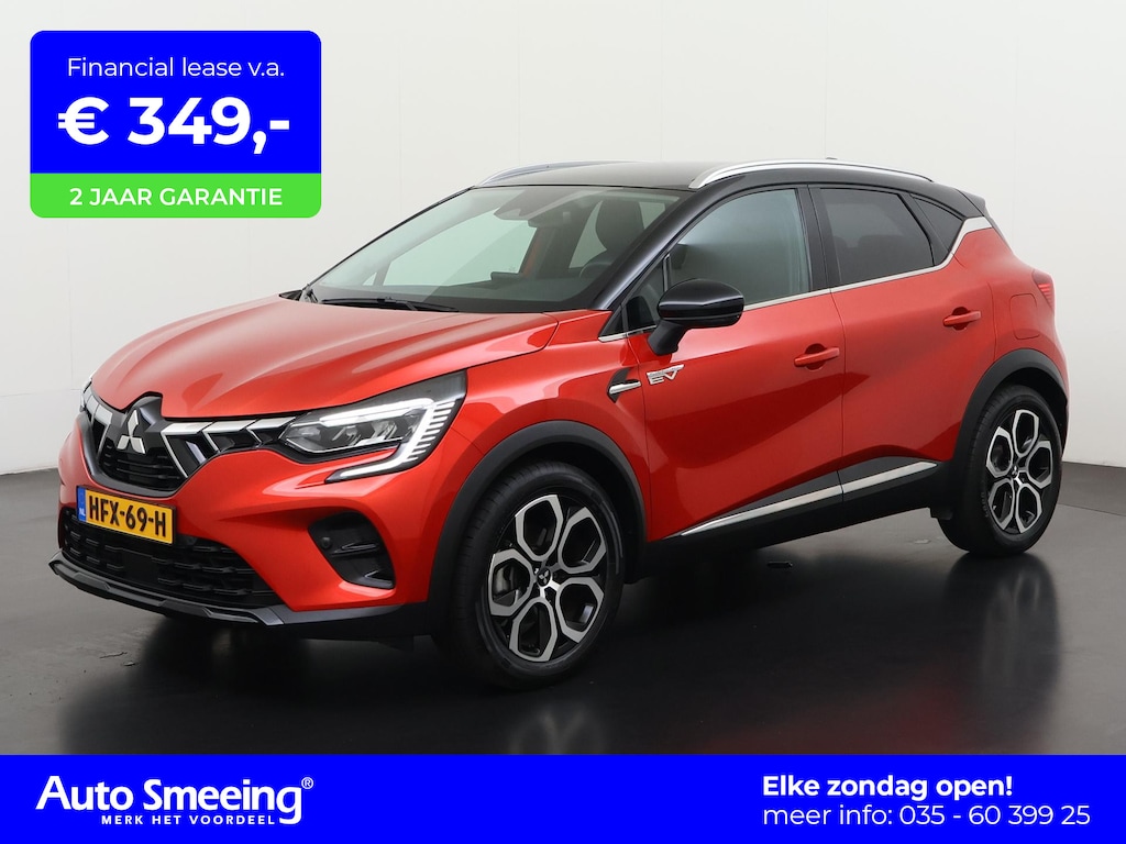 Renault Captur 1.6 PHEV Plug-in AT Intense Bi-Tone | Camera | Blind Spot | Stuur/Stoel Verwarming | Cruise control adaptief | Zondag Open!