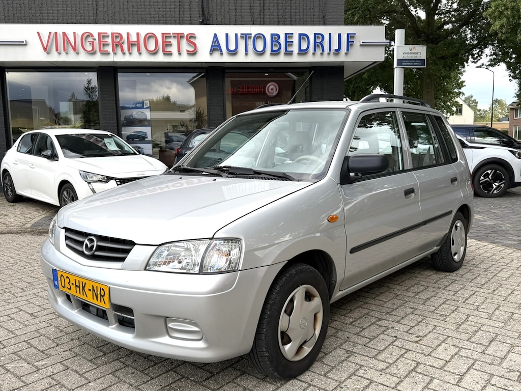 Mazda Demio 1.5 Exclusive *** AUTOMAAT *** 12 maanden APK * 5-Deurs met Trekhaak * 1 jaar APK + NAP Kilometer Autopas * Vingerhoets; Vierde Generatie Eersteklas Service. Al meer dan 100 jaar een begrip in de Brabantse Kempen