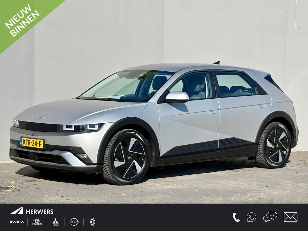 Hyundai Ioniq 5 Connect+ Limited 84 kWh / Fabrieksgarantie tot 06-2030 / SOH 99,1% / Warmtepomp CCS Snel laden / 1.600 kg Trekgewicht / Stoel en stuurverwarming / All Season Banden / Elektrische voorstoelen / Navigatie / Apple Carplay & Android Auto / Achteruitrijcamera / Rondom sensoren /