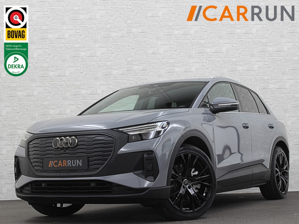 Audi Q4 e-tron 40 204pk 77 kWh | #RS-Leder | 96,7% SOH | 5x Q4 OP VOORRAAD! | ACC | Matrix-LED | Sfeerverlichting | 3 Zone Clima | Carplay | Getint Glas | Zwarte Hemelbekleding | Kieselgrau | Btw auto, 27150,= ex. | Bovag garantie. 4x Q4 op voorraad!
