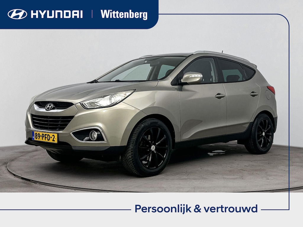 Hyundai ix35 2.0i Business Edition | Afneembare trekhaak | Achteruitrij camera | Airco | Cruise control | LM Velgen 17 inch | Bluetooth |