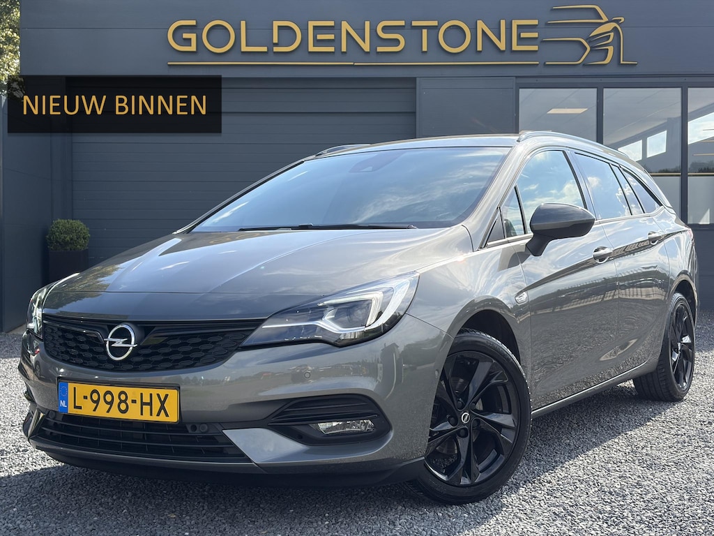 Opel Astra Sports Tourer 1.2 Ultimate ✓146pk✓Carplay✓Camera✓Stoelverw✓Stuurverw✓Keyless✓Pdc V+A✓Alcantara-Leder✓Clima✓Cruise✓6 Bak✓Rijstrooksensor✓Dodehoeksensor✓17''Lm velgen✓N.A.P✓Apk tot 11-2028