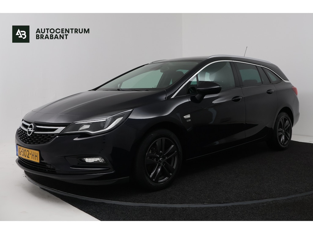 Opel Astra Sports Tourer 1.4 Turbo 120 Jaar Edition (NAVIGATIE, CRUISE CONTROL, PARKEERSENSOREN)