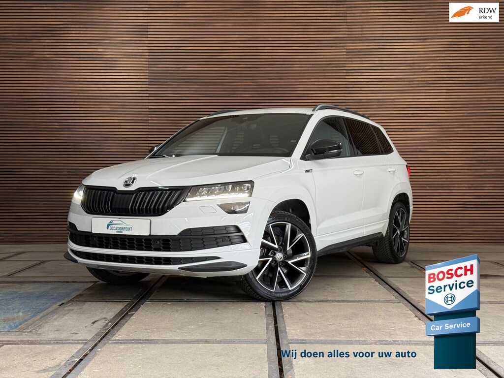 Skoda Karoq 1.5 TSI DSG 4x4 Sportline Business | 1800KG Trekgewicht | Carplay | Sportstoelen | Camera