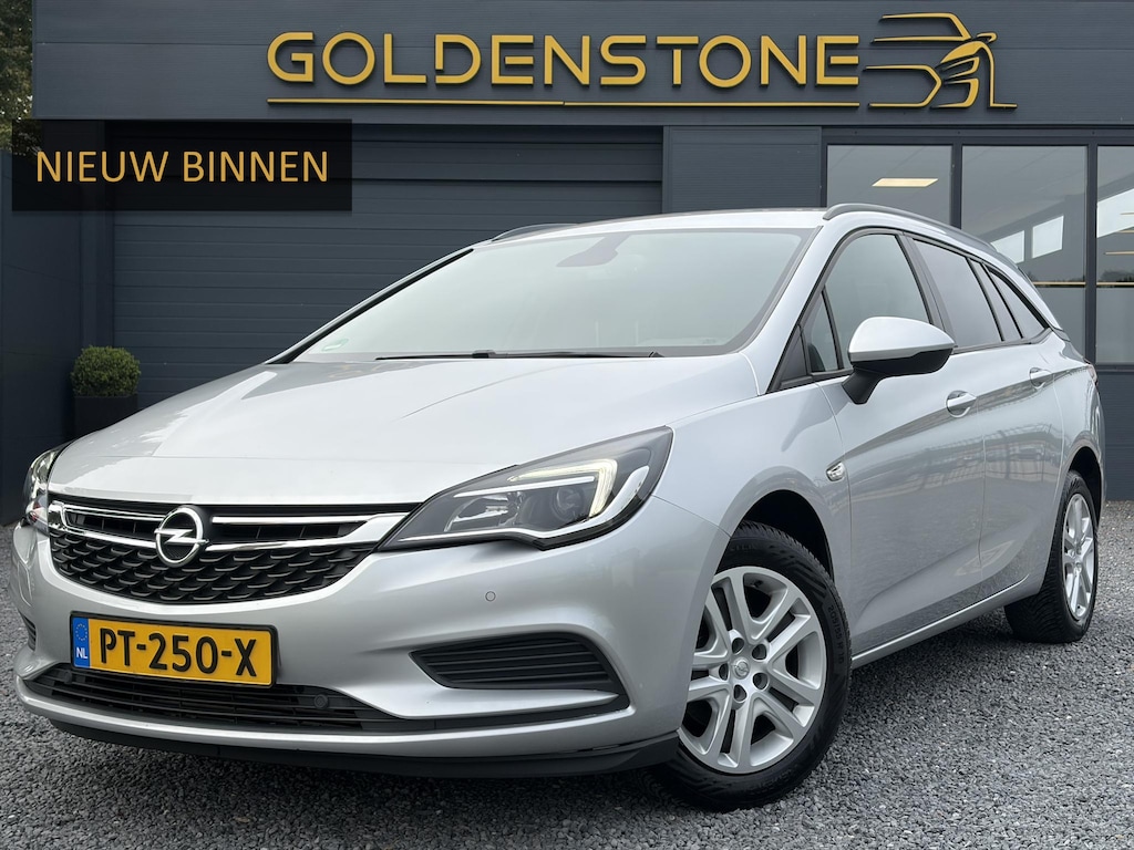 Opel Astra Sports Tourer 1.0 Online Edition ✓2e Eigenaar✓Carplay✓Navi✓Trekhaak✓Net beurt gehad✓Clima✓Cruise✓Pdc V+A✓105pk✓N.A.P✓Lm velgen✓Apk tot 10-2027