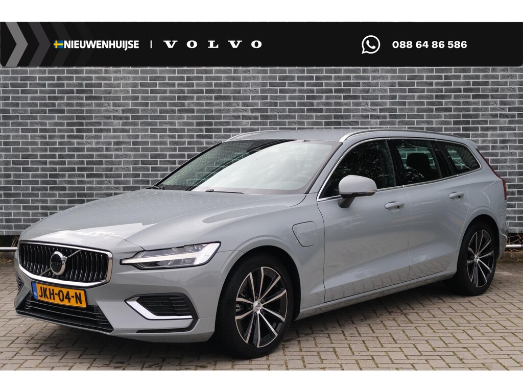 Volvo V60 2.0 T6 Plug-in Hybrid AWD Essential Bright | PHEV Long Range | Trekhaak | Lederen Bekleding | Achteruitrijcamera | Parkeersensoren | Stoelverwarming voor en achter | Cruise Control Adaptief | BLIS | Google Navigatie | Apple Carplay | Android Auto