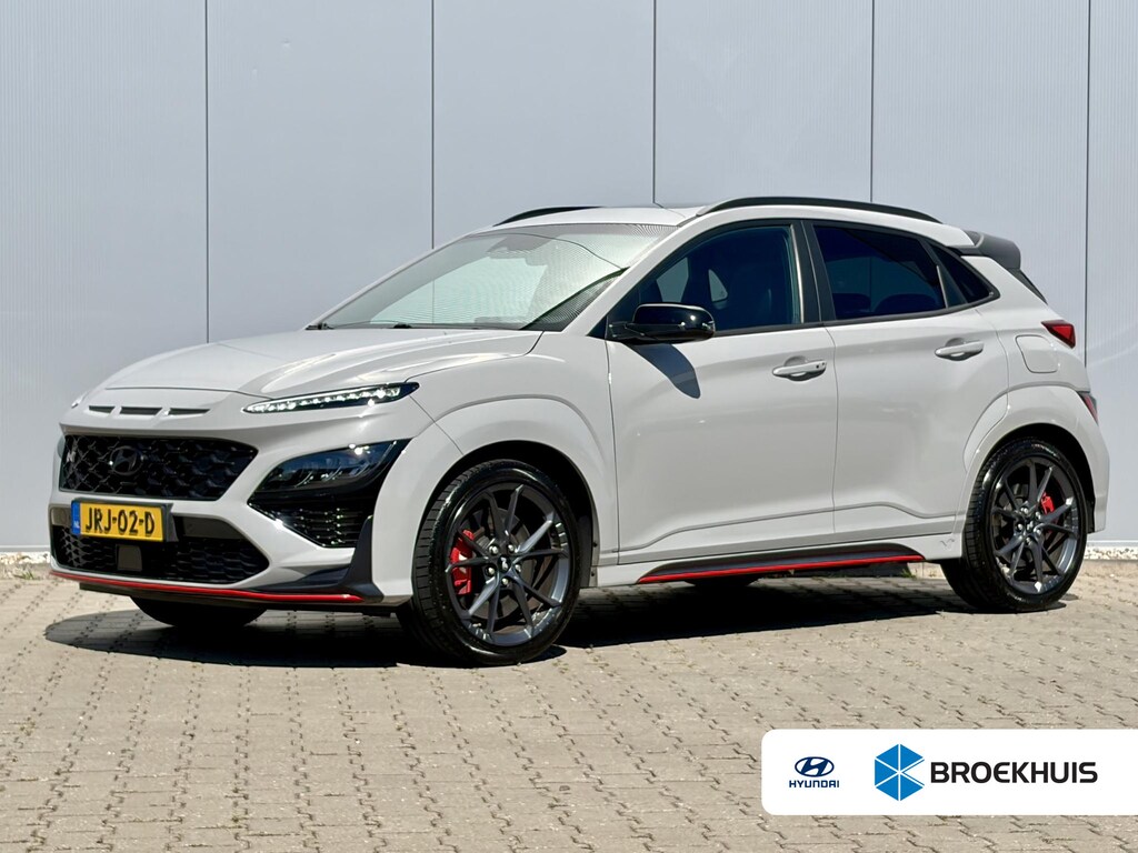 Hyundai Kona 2.0 T-GDI N Performance 280pk DCT8 / Cyber Grey / Fabrieksgarantie tot 04/2027 / Trekhaak / Schuifdak / Gratis set winterwielen / Dealer Onderhouden / Limited Slip Diff / Adaptieve Cruise / Adaptieve Onderstel / Stoel & Stuurwielverwarming / Elektr. Stoelen / Stoelventilatie / Navigatie / Camera / Dodehoek Detectie /
