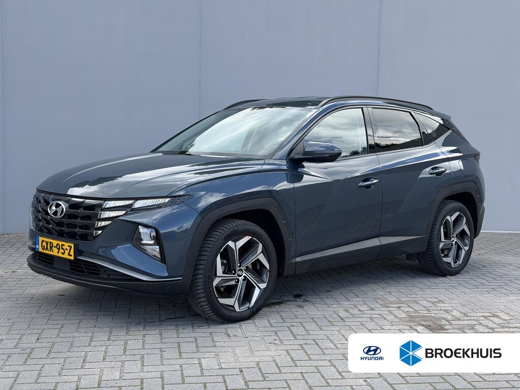 Hyundai Tucson 1.6 T-GDI PHEV Comfort Smart 4WD / Dealer Onderhouden / Fabrieksgarantie tot 9-2028 / Navigatie / Adaptieve Cruise / Stoel & Stuurwiel Verwarming / Keyless /