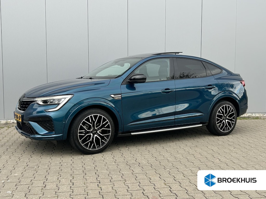 Renault Arkana 1.6 E-Tech Hybrid 145 R.S. Line / Schuif&Kanteldak / Navigatie / Airco / Lederen Bekleding / Cruise Control / | Apple Carplay/Android Auto | Blind Spot Warning | Elektrisch glazen schuif-/kanteldak