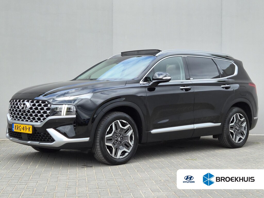 Hyundai Santa Fe 1.6 T-GDI PHEV Premium Sky / SOH 100% / Dealer onderhouden / Glazen schuif- en kanteldak / Head Up Display / Trekgewicht 1350 kg / Elektrische achterklep / Stuur- Stoel & Achterbank verwarming / Rondomzicht camera / Stoelventilatie /