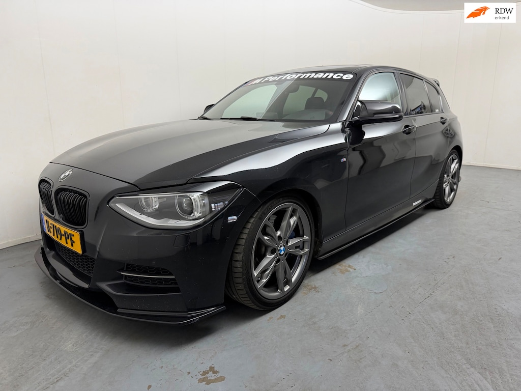 BMW 1-Serie M135i xDrive High Executive # 420 PK # Remus uitlaat # Leder # Navi # Xenon