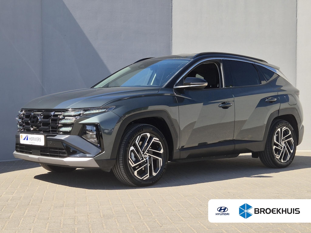Hyundai Tucson 1.6 T-GDI PHEV Comfort Smart / Facelift Model / Head Up Display / Trekgewicht 1210 kg / Elektrische achterklep / Stuur- & Stoelverwarming / Achteruitrijcamera / Adaptief cruise control / EAER bereik 68 km bereik stad 87 km / Draadloze telefoon lader / Keyless Entry/Start /