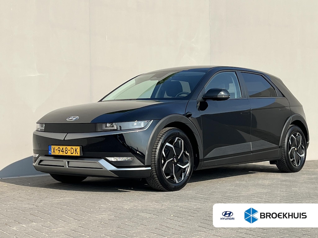 Hyundai Ioniq 5 Style 58 kWh / Fabrieksgarantie tot 10-2028 / Accu SoH 100 % / CCS snel laden / WLTP 384 km stad 587 km / Navigatie / Apple Carplay Android / Adapt. CC / 19"LM wielen & All Season banden /