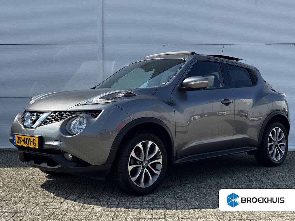 Nissan Juke 1.6 Tekna / Elektrisch Schuif-/Kanteldak / Panoramadak / Navigatie / Achteruitrijcamera Rondomzicht / Cruise Control / Climate Control / Bluetooth / Stoelverwarming / Lane Assist / Keyless / DAB /