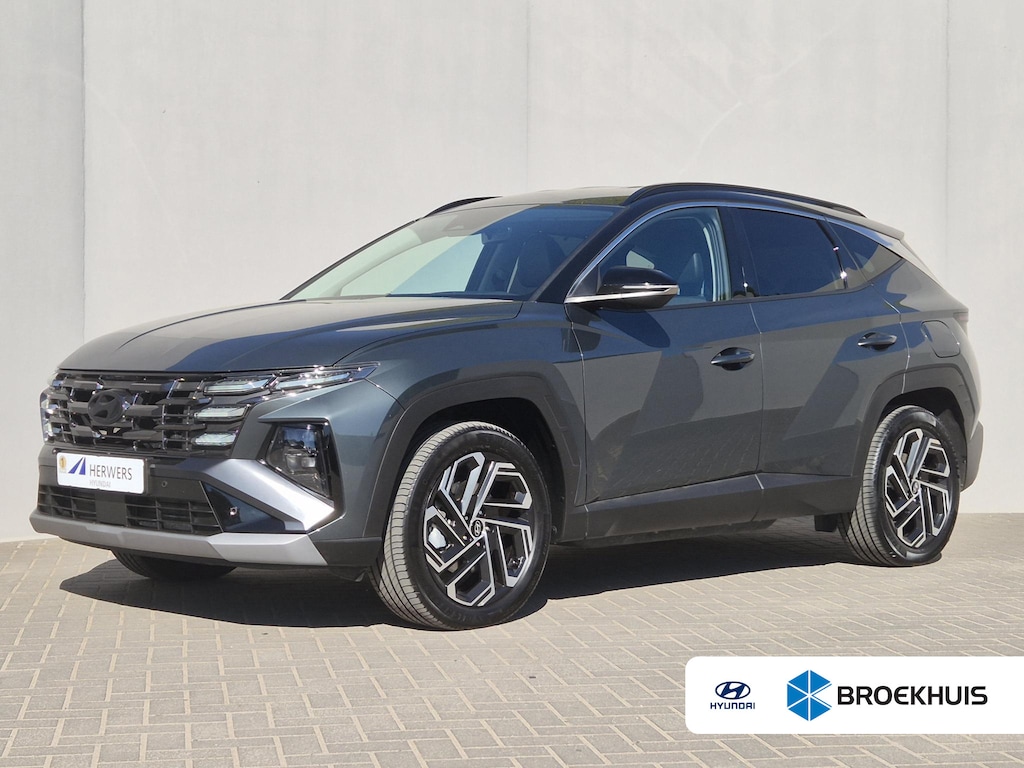 Hyundai Tucson 1.6 T-GDI PHEV Comfort Smart / Facelift Model / Dealer onderhouden / Fabrieksgarantie tot 09-2029 / Head Up Display / Trekgewicht 1210 kg / Elektrische achterklep / Achteruitrijcamera / Draadloze telefoon lader / Apple Carplay Android Auto / Stuur- & Stoelverwarming / Keyless Entry/Start /